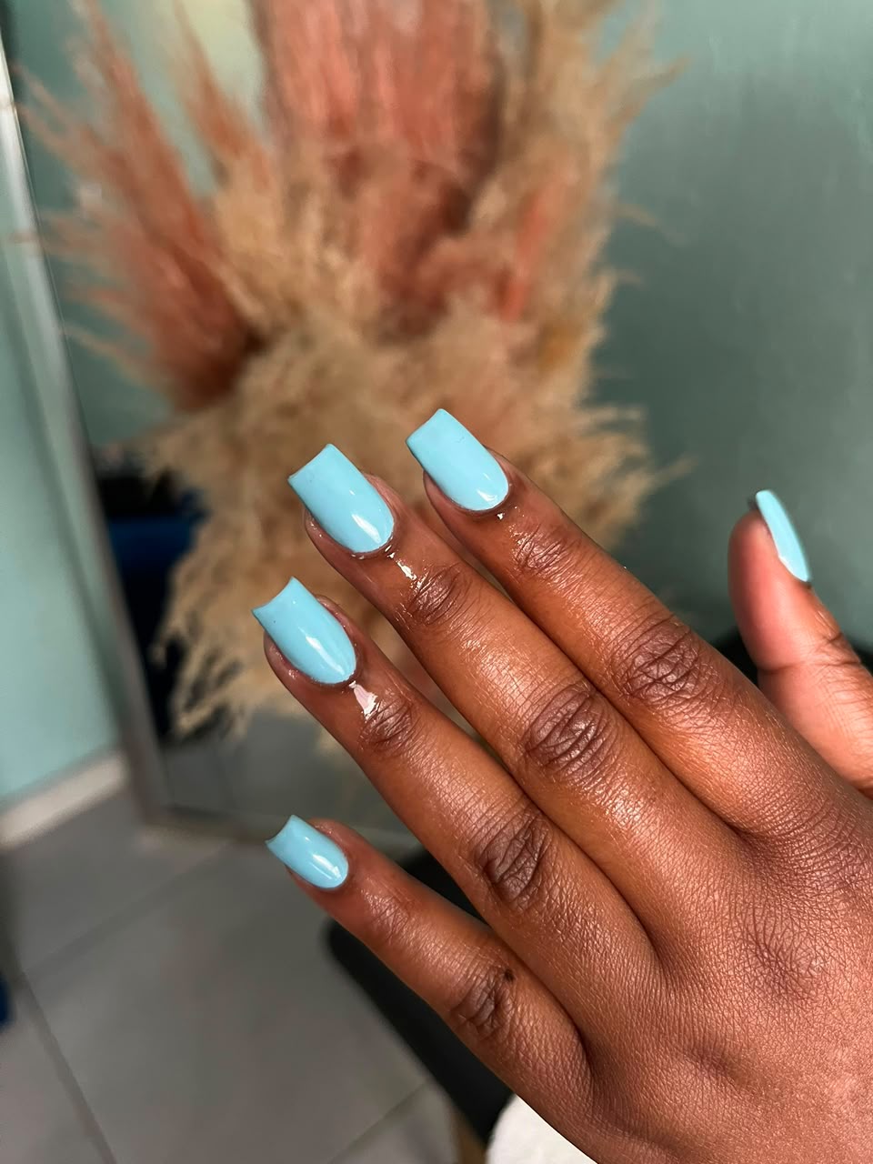 Light blue nail set created at Bubbles Beauty Bar