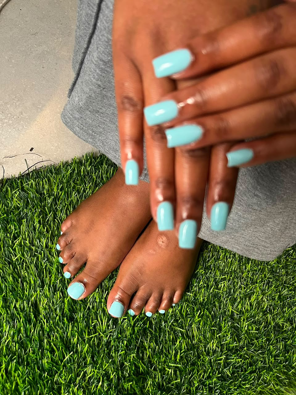 Blue manicure and pedicure created at Bubbles Beauty Bar