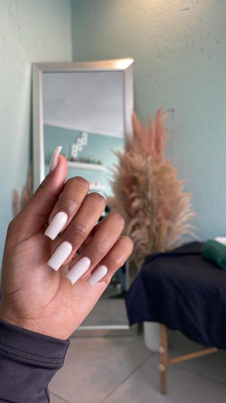 Soft neutral nail set created at Bubbles Beauty Bar